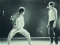 Bruce Lee Lighting Matches with Nunchucks