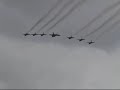 F-22 Raptor Flies with Thunderbirds