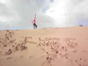 Calista Doing A Backflip On The Sand Dunes