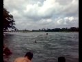 Local boys dive into the river and collect the coins which is offered to the river.