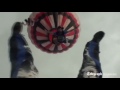 Amateur footage captures the moment a hot-air balloonist saved the lives of five skydivers by ordering them to jump before a thunderstorm caused the craft to crash to the ground.