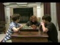 An older videoA Heckler(Gaige Crooms) watches and disrupts a nice quiet chess match between two friends(Kyle Pauley, Elliot Teague)