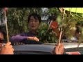Suu Kyi on campaign trail for own parliament seat