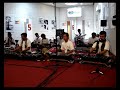 Javanese Gamelan Group 'Kiai Kanjeng' plays 'Imagine' (Lennon) and more!
Performance at Radio Netherlands in Hilversum, 15 October 2008. Shot by me with a miniscule handheld Sony Cybershot Camera, that doesn't even offer a zooming option :) 

The leader of the Group, Emha Ainun Najib, is a well known figure in Indonesia. He's a poet, musician, essayist, artist who preaches tolerance and mutual respect and understanding between people of different cultural and religious backgrounds. With his peaceful message he's touring in the Netherlands for ten days with his group Kiai Kanjeng. The group is invited to Holland by the Dutch Protestant Church Organization PKN. The music played by Kiai Kanjeng bears elements of traditional Javanese and Balinese gamelan in its playing techniques (for instance the interlocking melodic and/or rhythmic parts attributed to different players, some of the rhythms being played,the way melodies are sometimes embellished and of course the muting of subsequent notes after being struck by the hammers of the players), but in fact this music manifests a modified and modernized gamelan sound in evry way: gamelan structures seem to blend easily with Arabian-like melodies and rhythms, with krontjong, dangdut and with western pop and jazz elements. There's a peculiar and often funny switching between traditional singing and pop style singing. The Kiai Kanjeng Gamelan Group uses the western diatonic scale, so we're far removed here from the traditional pentatonic pelog- and/or slendro-tuning. Added to the gamelan are the violin and pop instruments like bass, electric guitar, drums and keyboards. Is this new? No, not really. Experimenting with gamelan sounds happens a lot in Indonesia and seems to co-exist in good balance and harmony with ensembles who stick to tradition. Experimenting with gamelan can show great results, and Kiai Kanjeng sets a very fine example of how a gamelan orchestra can be used in many different musical ways.

Happy Listening!