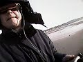 flew the plane 100% from the video goggles view and managed to get a recording on my aiptek media recorder. i am afraid to test the limits of distance for the wireless video and the radio control, but already i can fly much further away with fpv (first person view) than i would with line-of-sight control looking at the plane from the ground. even landing it with goggles is pretty easy. i think i have a lot of practice to do before i can fly through windows like gabriel2584 though...