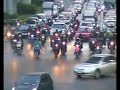 motorcycles waiting in traffic light - Bangkok Thailand