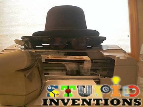 Make A Self-Playing Harmonica With A Printer And A Vacuum Cleaner