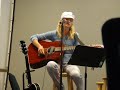 Heidi singing/playing a song she wrote