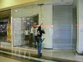 cleaning-shop-windows-with-extension-pole.html