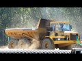 Caterpillar D300D articulated dump truck at work