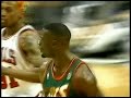 Shawn Kemp dunks on Scottie Pippen