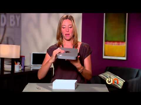 Mac Mini - http://cnet.com/alwayson Attention home-theater fans: Apple has updated its Mac Mini computer for the holidays. Molly Wood unboxes the 2012 model and gives h...