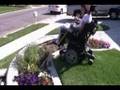 Wheelchair 60-Inch Weed Twister vs Weeds in Flowerbed