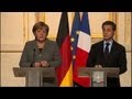 Merkel in Paris in bid to rescue Sarkozy vote hopes