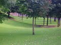 Girl playing bagpipes in Kelvingrove Park