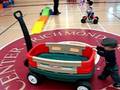 Little Asher pushing a wagon around