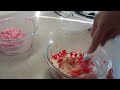 This one has lots of chilling time, but it easy to do. End result is very pretty! 1- 6 oz jar maraschino cherries 1/2 cup butter, softened 1/2 cup shortening 1- 3 oz package cream cheese softened 2/3 cup sugar 1/2 tsp salt 1 egg 1/2 tsp almond extract 2 cups all purpose flour Red food colouring Milk Drain cherries reserving juice. Pat cherries dry and finely chop them until you have 1/3 cup. Spread chopped cherries on paper towels and pat dry. Combine butter, shortening and cream cheese in a large bowl, beat together until smooth. Add sugar and salt. Beat until combined. Beat in egg and almond extract until combined and gradually add the flour beating until combined. Divide dough into three portions, leaving one portion plain. Into a second portion knead 1/2 tsp of the reserved cherry juice and enough red food colour to make a light pink dough. Into the third portion of dough, knead in the chopped cherries. Wrap each portion in plastic wrap and chill for 2 hours or until easy to handle. Roll out each portion of dough between sheets of parchment paper into a 6 inch square. Wrap with plastic wrap and freeze for about 30 minutes until firm. Place cherry dough on a piece of parchment, brush with a little bit of milk. Place plain dough square on top and brush with a little bit of milk. Place pink dough square on top of two other squares and press down lightly all over. Trim edges to remove rough parts. Cut dough stack into thirds, cover and freeze for about 20 minutes or until <b>...</b>