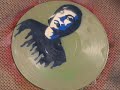 Lapse - Stencil art on vinyl records in a time lapse video.