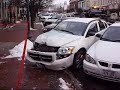 Car Drives into Storefront in Pella