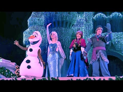 Frozen Holiday Wish castle lighting show debut - Elsa, Anna, Olaf, Kristoff at Walt Disney World
