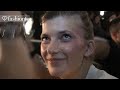 www.FTV.com NEW YORK - The models are getting ready in backstage at the Tadashi Shoji show for New York Fashion Week Spring/Summer 2012 and we say hello to Jefimija, then spy model Daiane Conterato getting her hair done. Hair is pulled back to a half pony with two braids going around the...