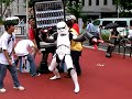 Danny Choo clad in a Stormtrooper costume terrorizing the demonstrators with his new found attachments.