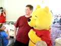 Matt hugs Pooh Bear