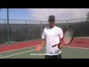 flip shot with two handled tennis racket like Rafael Nadal S