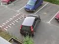 Inept Woman Driver in Parking Lot