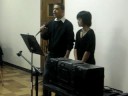 Azela and Luis.singing \"Satisfied\"
