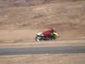 Austin DeHaven running his Honda RS125 at Steets of willow