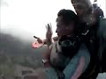 Pug skydiving with his master at 10,000 feet.
