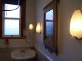 BATHROOM WITH ITALIAN MARBLE, PEDESTAL SINK &CAST IRON BATH