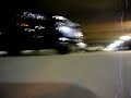 digicam strapped to RC car in parking garage