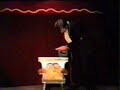 SAWING WOMAN-ILLUSION WITH MAGICIAN SEUQCAJ