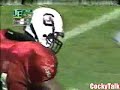 Shannon Wadley of the University of South Carolina pops Fred Talley of Arkansas in the 2000 game at Williams Brice Stadium