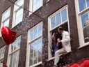 Fragment of Opera out of open window at the Zeedijk. Fragment of Opera out of open window at the Zeedijk.