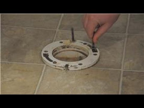 how to fasten toilet to floor