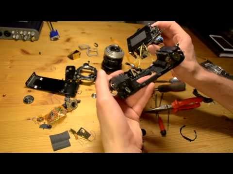 how to open a minolta x-370 camera