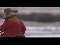 red steagall music video featuring cowboys driving 400 horses through mountain snow