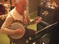 jim robinson (88) tenor banjo, and ruthellen robinson (85) piano, play rose room, at home in kansas city, in 2001 (less)