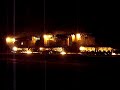 Loram rail grinder at night