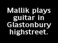 Mallik Playing Guitar in Glastonbury