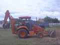 Operdor de p� carregadeira, retro escavadeiras