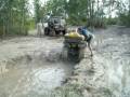 4 wheeler in loader hole