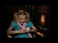 http://www.youtube.com/watch?v=18m3lt5lumc chuck the movieguy interviews the adorable dakota fanning for the first time. the talk about her scary movie, read...