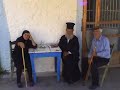 Greek priest in taverna at lake Prespa - mainland Greece