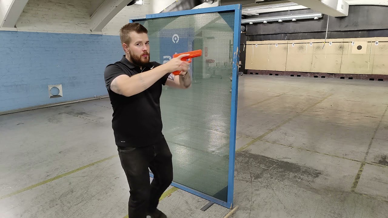 Suojan takaa ampuminen