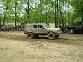this chevy truck got itself stuck in a big mud hole at the mounds park. for a second, it looked like the guy in the xj was going to rip his rear end off getting him out.