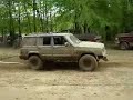 this chevy truck got itself stuck in a big mud hole at the mounds park. for a second, it looked like the guy in the xj was going to rip his rear end off getting him out.